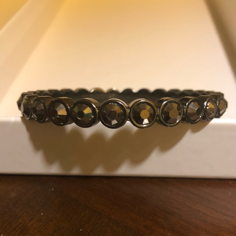 Charcoal ice CZ in a stainless bangle. Great flash